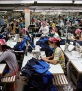 Employees work at the W & D Cambodia Co. Limited garment factory in Phnom Penh