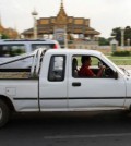 An-old-utility-vehicle-travels-on-Preah-Sisowath-Quay-past-the-Royal-Palace-yesterday-in-Phnom-Penh