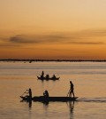 fishermen-in-silhouette-on-tonle-sap-axiom-photographic