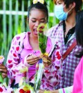 youths_buy_froses_from_a_flower_vender_in_phnom_penh_in_february_2012_pha_lina