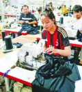 garment-factory-workers-produce-items-of-apparel-at-a-warehouse-in-kandal-province-last-year.-heng-chivoan