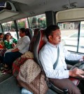 a_bus_driver_travels_down_monivong_in_a_city_bus_08_04_2016_pha_lina