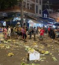 a_street_is_strewn_with_fruit_following_the_confrontation_between_neak_meas_market_vendors_and_tuol_kork_authorities_on_sunday._fb