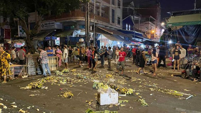 a_street_is_strewn_with_fruit_following_the_confrontation_between_neak_meas_market_vendors_and_tuol_kork_authorities_on_sunday._fb