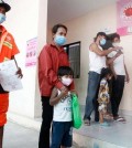 people_bring_their_children_for_covid-19_vaccinations_at_the_chbar_ampov_referral_hospital_in_phnom_penh_on_march_2._heng_chivoan