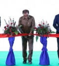 agriculture_minister_veng_sakhon_centre_cuts_the_ceremonial_red_ribbon_to_herald_the_opening_of_a_15_million_factory_in_kampong_speu_province_reportedly_able_to_produce_180000_tonnes