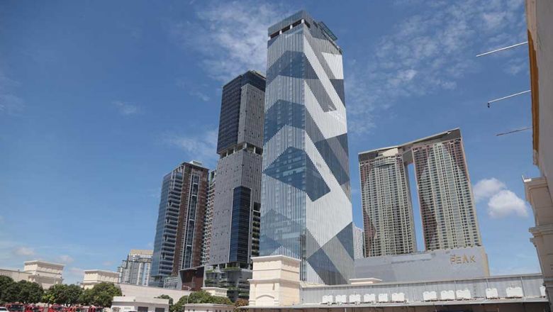 a_group_of_skyscrapers_tower_above_the_horizon_in_the_capitals_chakmarmon_district_on_may_26._heng_chivoan