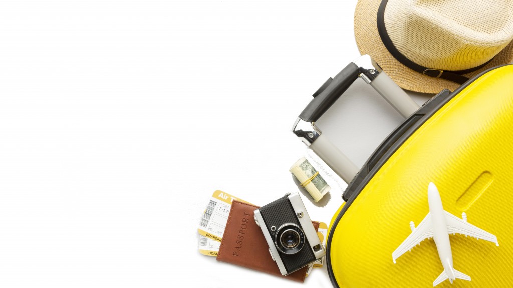 flat-lay-yellow-luggage-with-copy-space