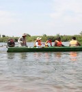 agriculture_minister_dith_tina_takes_a_boat_trip_to_the_freshwater_dolphin_conservation_area_in_kratie_province_on_january_25._agriculture_ministry