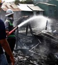 firefighters_at_work_in_the_boeung_trabek_area_in_phsar_doeum_thkov_commune_of_the_capitals_chamkarmon_district_on_march_20._heng_chivoan