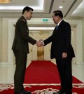 prime_minister_hun_sen_shakes_hands_with_major-general_david_neo_commander_of_the_singapore_army_on_february_28._spm
