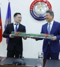 transport_minister_sun_chanthol_right_and_china_metro_groups_li_kuo_discuss_investment_in_infrastructures_on_march_17._mpwt