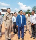 pursat_governor_khoy_rida_in_blue_suit_and_his_thai_counterpart_on_his_right_during_an_inspection_of_the_border_area._pursat_administration