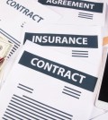 BandiView_close-up-smartphone-money-graphs-charts-workplace-office-business-concept_by-jcomp.jpg